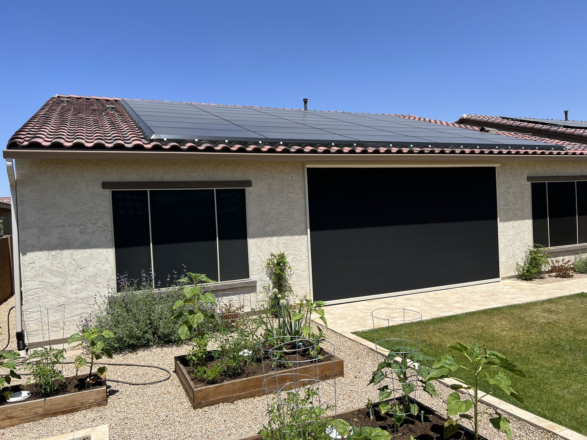 House Backyard with Tesla Solar Panels